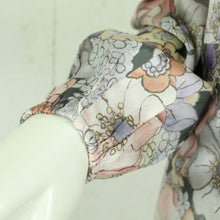 Laden Sie das Bild in den Galerie-Viewer, Second Hand DEA KUDIBAL Wickelkleid mit Seide Gr. L Seidenkleid geblümt NEU (*)