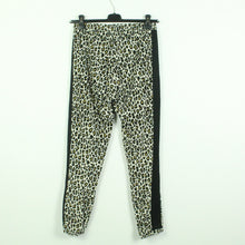Laden Sie das Bild in den Galerie-Viewer, Second Hand PUMA x CHARLOTTE OLYMPIA Sweatpant Gr. XS schwarz creme Animalprint  (*)