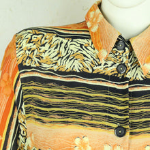 Laden Sie das Bild in den Galerie-Viewer, Vintage Bluse Gr. M orange schwarz mehrfarbig gemustert