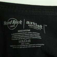 Laden Sie das Bild in den Galerie-Viewer, Vintage HARD ROCK CAFE T-Shirt Gr. M schwarz mit Print Rihanna