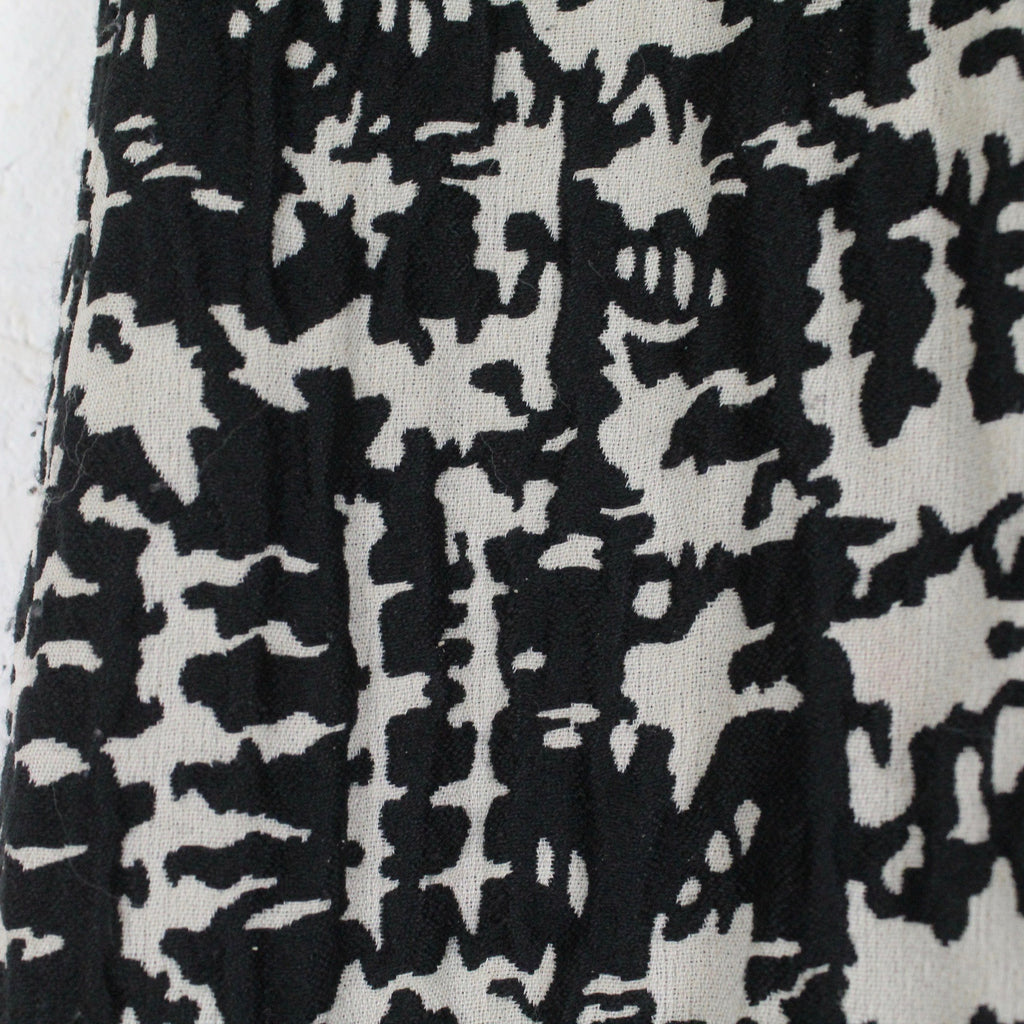 Second Hand SCHUMACHER Rock mit Wolle Gr. 3 schwarz grau gemustert Midirock (*)