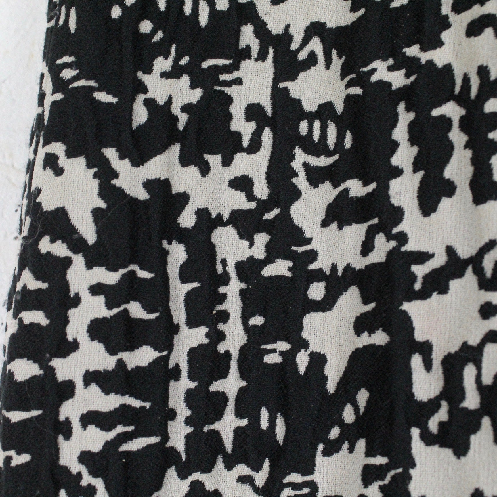 Second Hand SCHUMACHER Rock mit Wolle Gr. 3 schwarz grau gemustert Midirock (*)