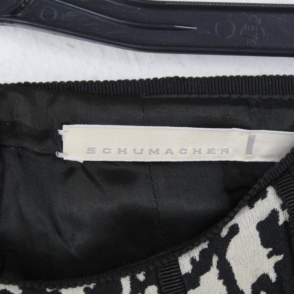 Second Hand SCHUMACHER Rock mit Wolle Gr. 3 schwarz grau gemustert Midirock (*)