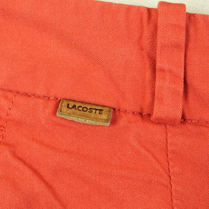 Second Hand LACOSTE Shorts Gr. 34 orange Chino Shorts (*)
